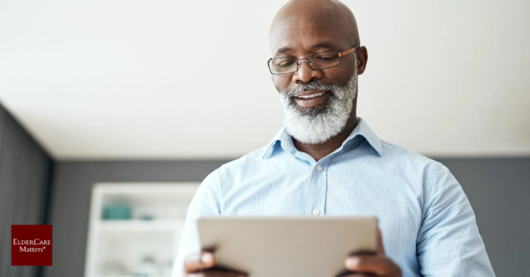 Elderly couple using a laptop to search for elder care resources online.